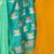 turquoise woven design zari silk blend jamdani saree