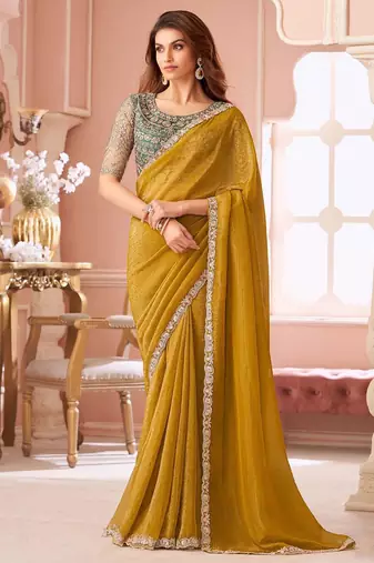 mustard embelished beads and stones pure georgette saree