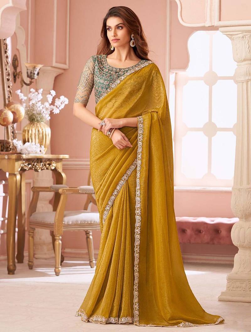 mustard embelished beads and stones pure georgette saree