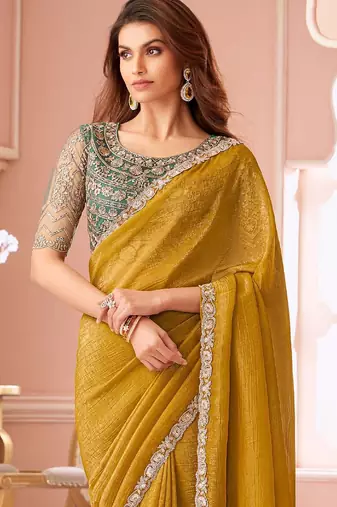 mustard embelished beads and stones pure georgette saree