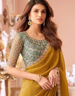 mustard embelished beads and stones pure georgette saree 3