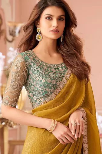 mustard embelished beads and stones pure georgette saree