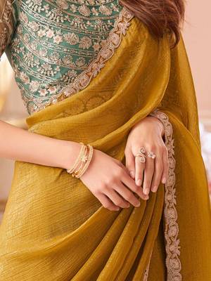 mustard embelished beads and stones pure georgette saree 4