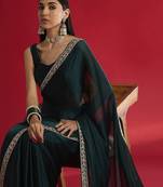 teal sequinned embellished satin saree