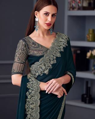 teal embroidered pure chiffon saree 1