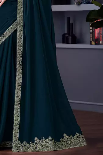 teal embroidered pure chiffon saree