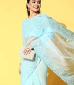 blue floral organza saree with embroidered border