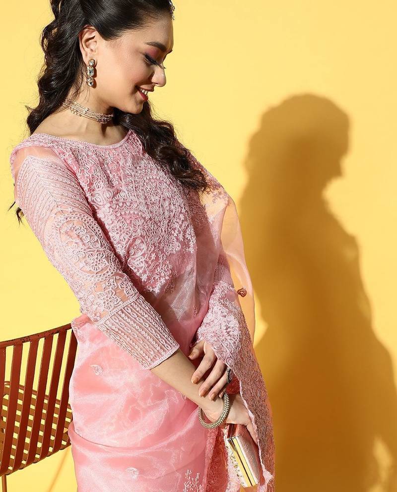 pink ethnic motifs saree with embroidered border