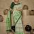 green green & cream-coloured ethnic motifs art silk ikat saree