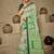 green green & cream-coloured ethnic motifs art silk ikat saree