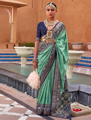 sea_green sea green & blue ethnic motifs woven design silk blend patola saree 1
