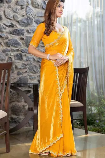 yellow beads and stones satin saree