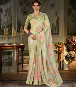 green tie and dye embroidered organza saree