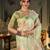 green tie and dye embroidered organza saree
