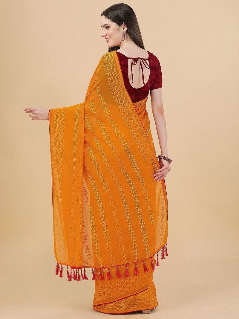 yellow lucknowi embroidered and diamond embellished georgette saree