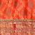 coral coral & red bandhani zari dola silk half and half bandhani saree