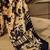 beige geometric printed satin saree