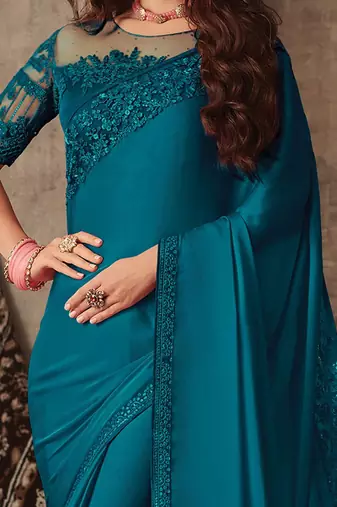 teal sequinned saree
