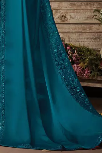 teal sequinned saree