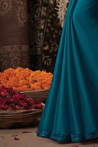 teal sequinned saree