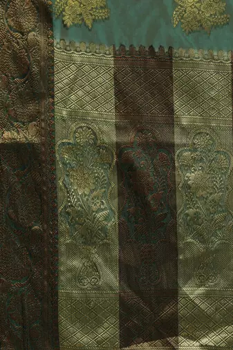 green green & gold-toned ethnic motifs zari organza saree