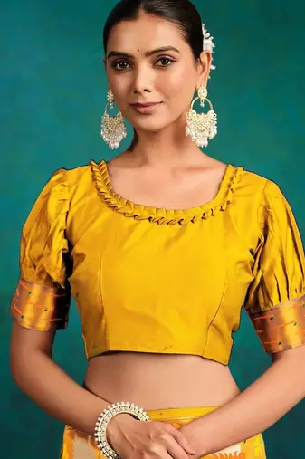 mustard ethnic motifs woven design zari paithani saree