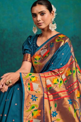 green woven designed zari paithani saree