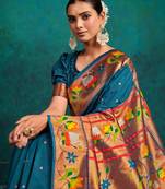 green woven designed zari paithani saree