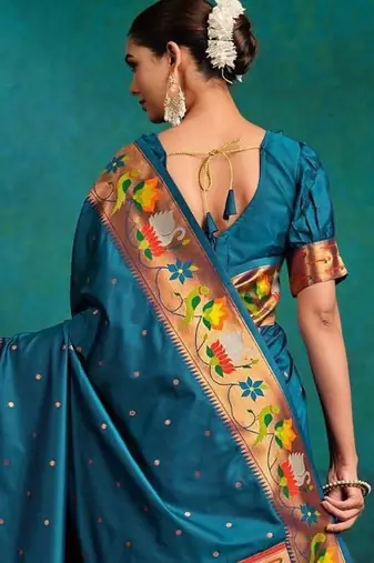 green woven designed zari paithani saree