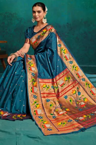 green woven designed zari paithani saree