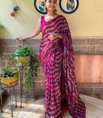 purple embellished sequinned poly georgette saree