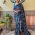 teal sequinned pure georgette saree