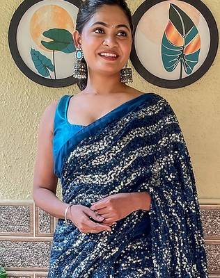 teal sequinned pure georgette saree 3