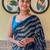 teal sequinned pure georgette saree