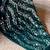 green sequinned poly georgette saree