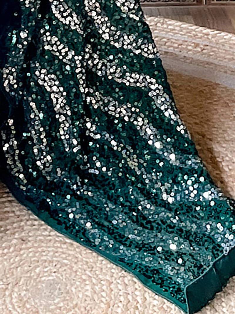 green sequinned poly georgette saree