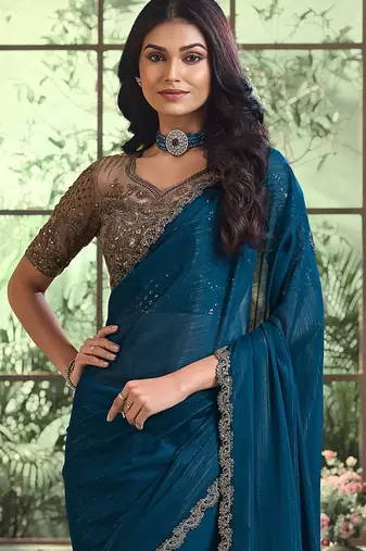 teal poly georgette saree
