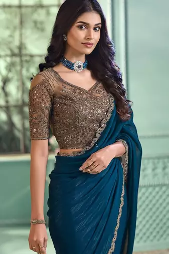 teal poly georgette saree