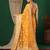 cream floral printed saree with tassels