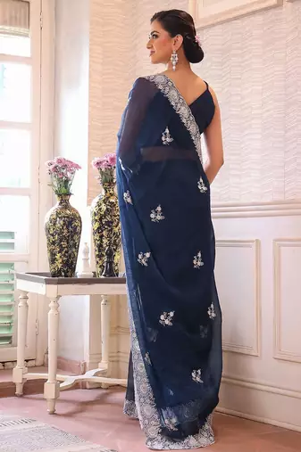 teal floral embroidered sequined pure chiffon saree