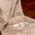 cream cream-coloured & silver-toned floral silk blend muga saree