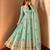 Mint green peacock feather embroidered silk gown with pant & dupatta