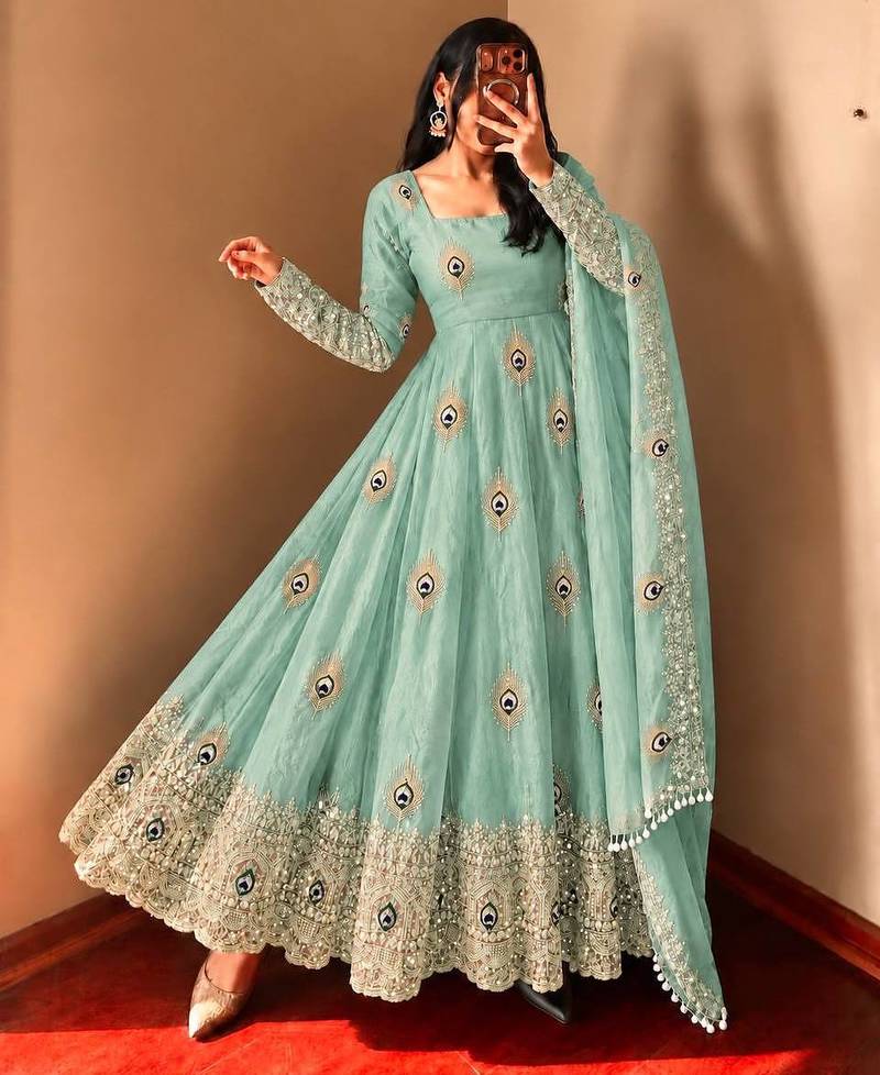 Mint green peacock feather embroidered silk gown with pant & dupatta