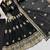 Black peacock feather embroidered silk gown with pant & dupatta