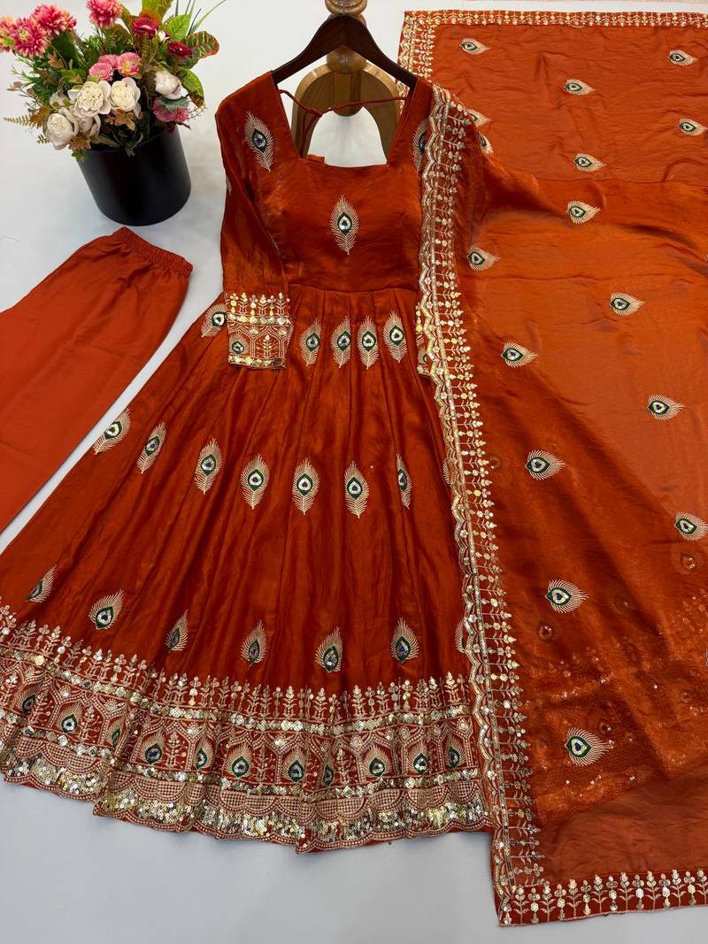 Orange peacock feather embroidered silk gown with pant & dupatta
