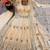 Beige peacock feather embroidered silk gown with pant & dupatta