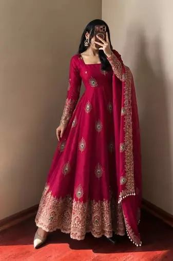 Rani pink peacock feather embroiderani pink silk gown with pant & dupatta