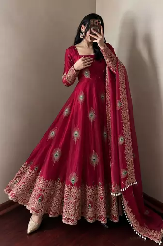 Rani pink peacock feather embroiderani pink silk gown with pant & dupatta