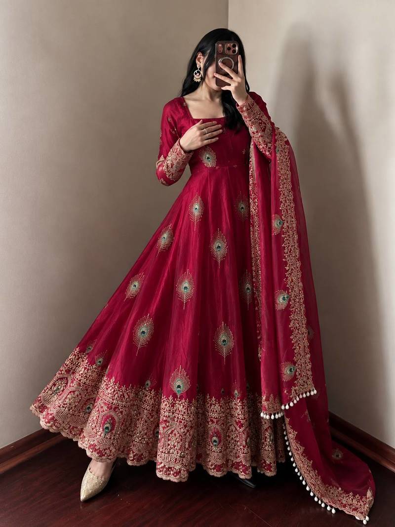Rani pink peacock feather embroiderani pink silk gown with pant & dupatta