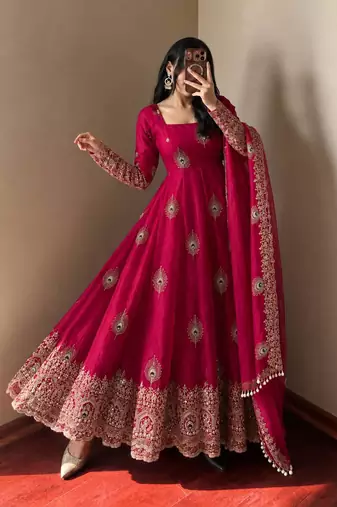 Rani pink peacock feather embroiderani pink silk gown with pant & dupatta